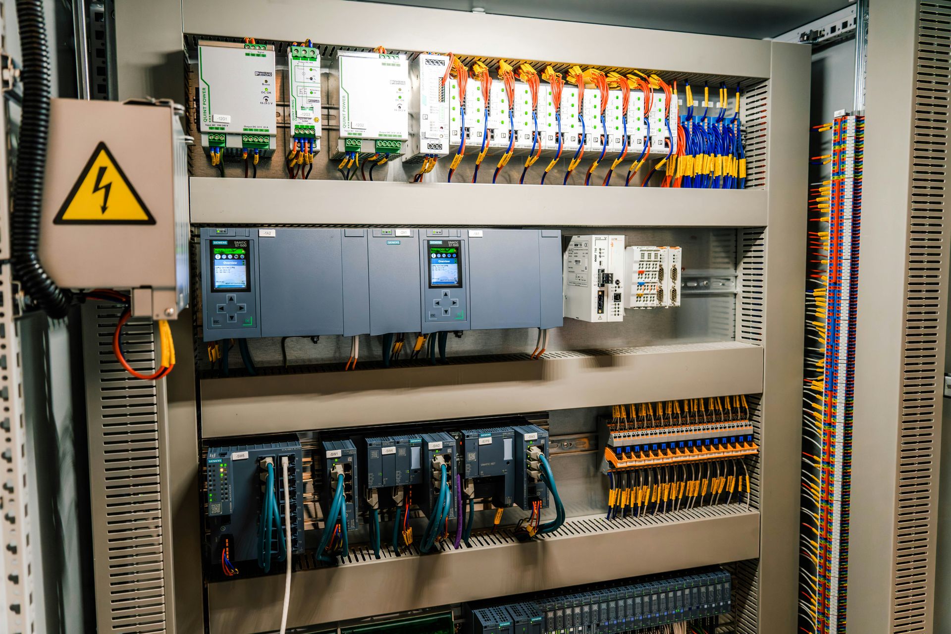 Industrial electrical control panel with wiring and electronic components